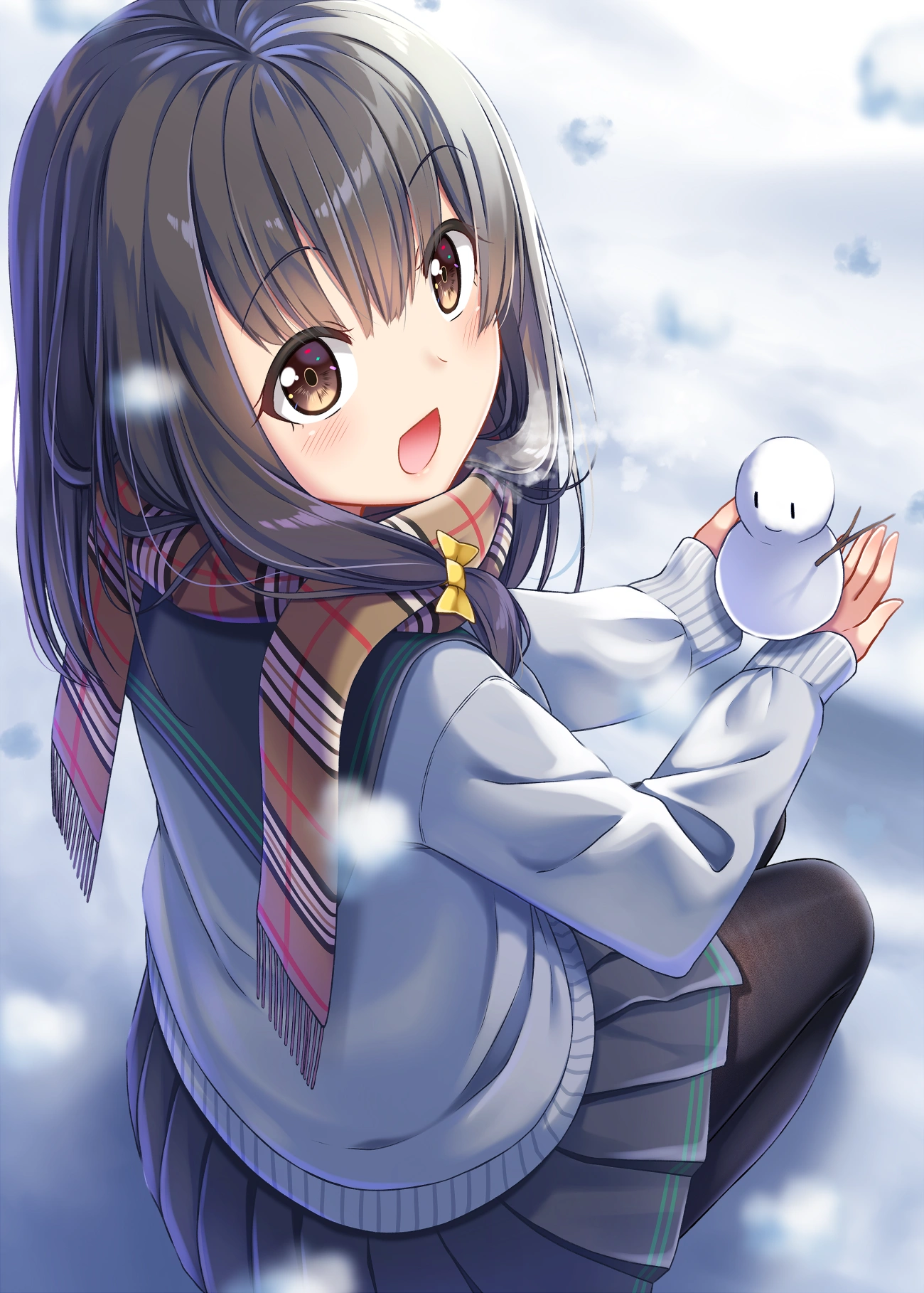 Girl holding a snowman